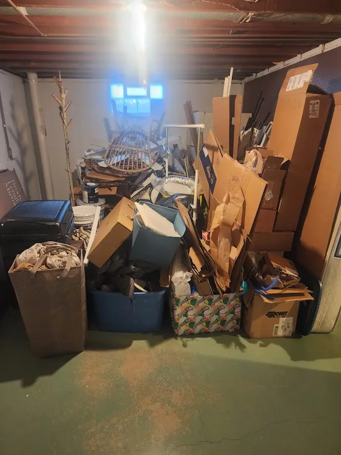 Roll-off dumpster container at job site for 2 Yard Dumpster Rental in Sharpsville